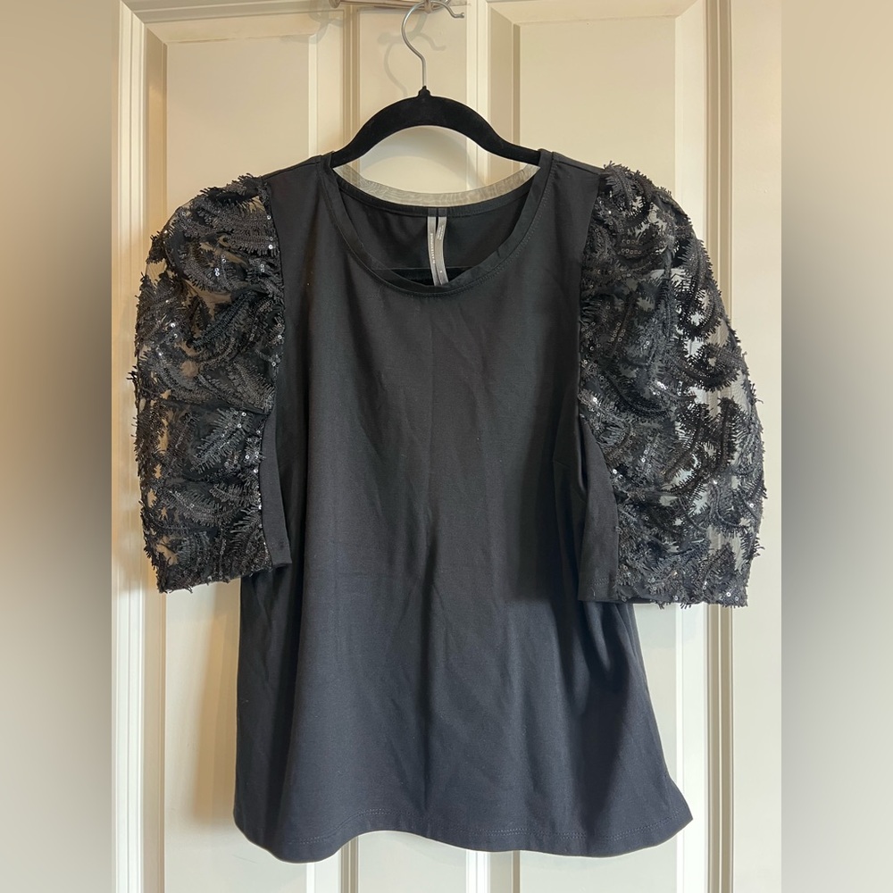 Anthropologie black sequin puff sleeve top. Size small.